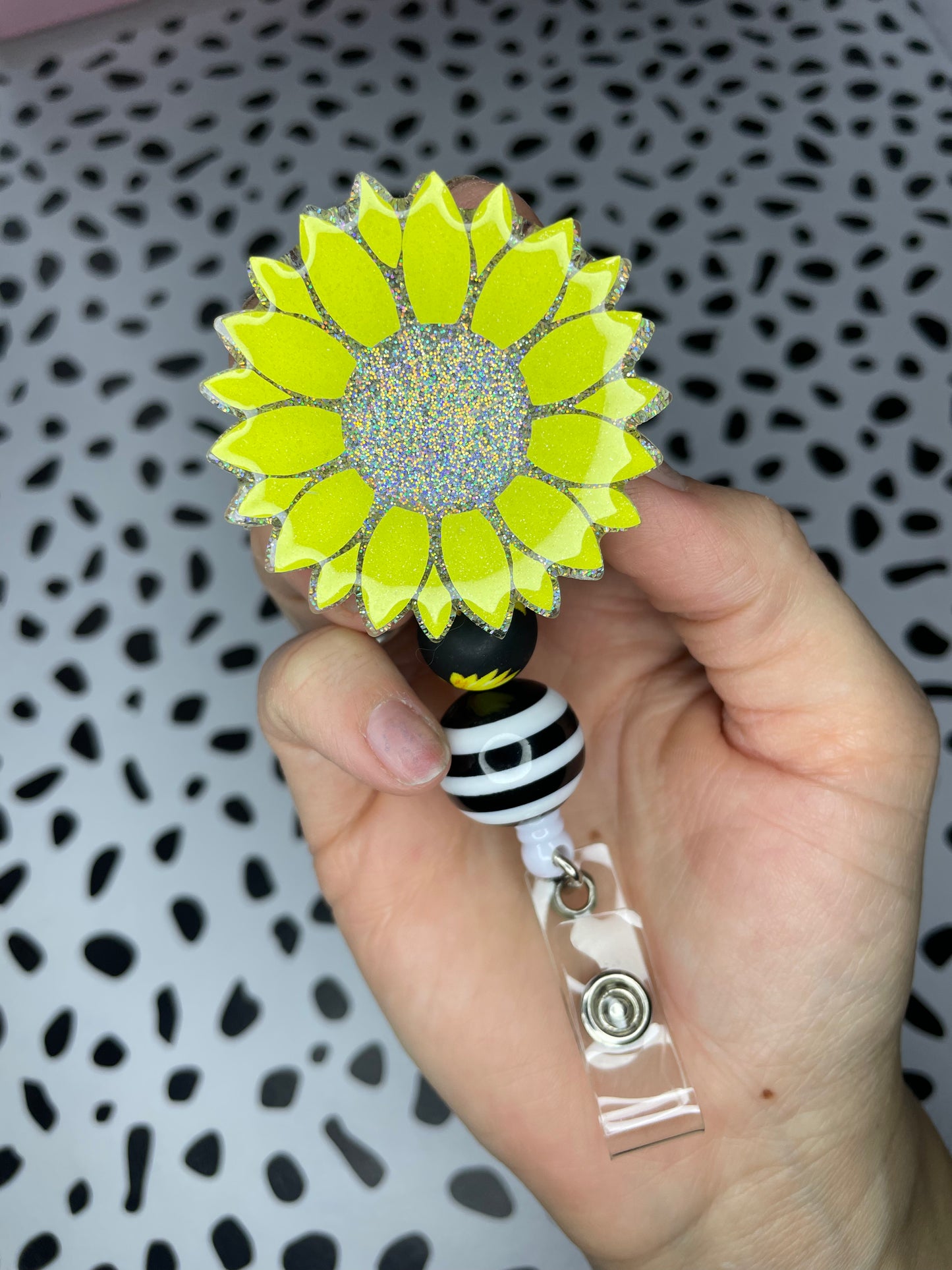 Sunflower badge reel