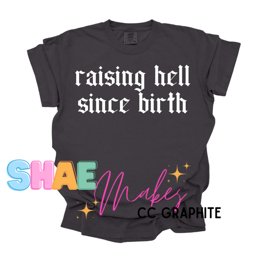 Raising hell since Birth (blk or white font)